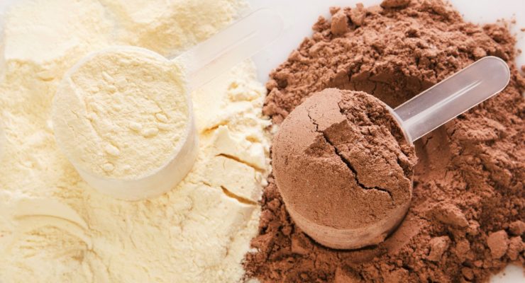 chocolate and vanilla protein powder in plastic scoops