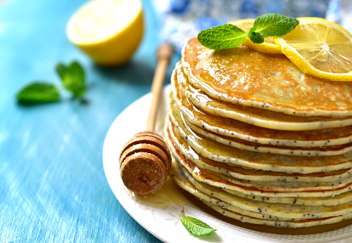 Healthy breakfast recipes homemade poppy seed lemon pancakes with honey.