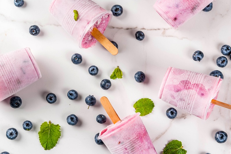 frozen yogurt cups with blueberries and mint
