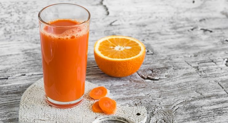 orange carrot and ginger smoothie with anti-inflammatory ingredients