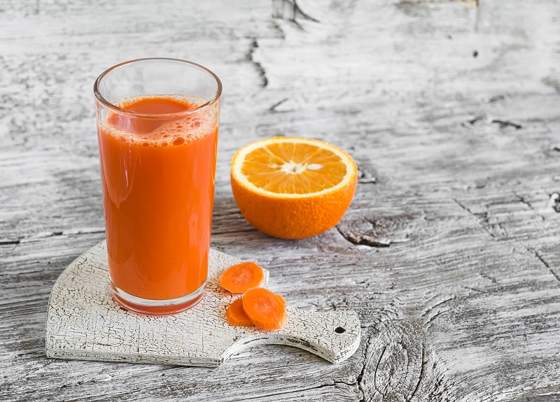 orange carrot and ginger smoothie with anti-inflammatory ingredients