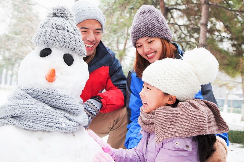 family building snowman. holiday activities