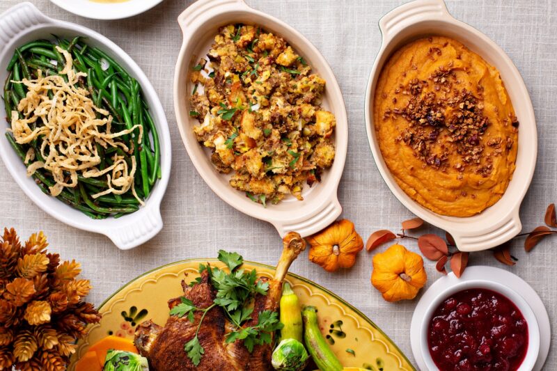 healthy thanksgiving side dishes, including green bean casserole, stuffing and mashed sweet potatoes