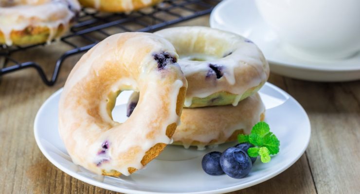 air fryer blueberry donuts on a plate