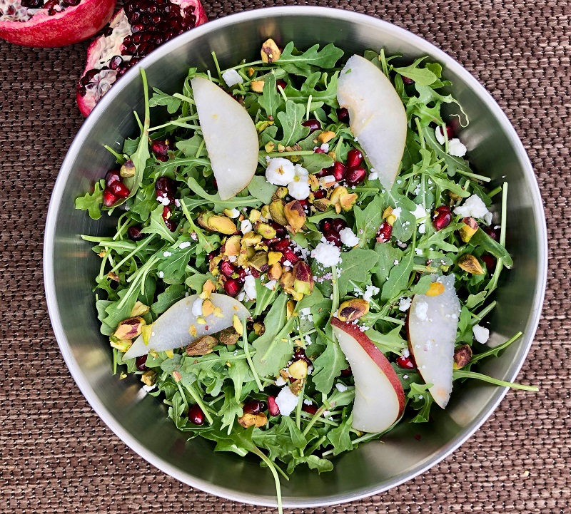 Fresh summer salad with pomegranate and rocket