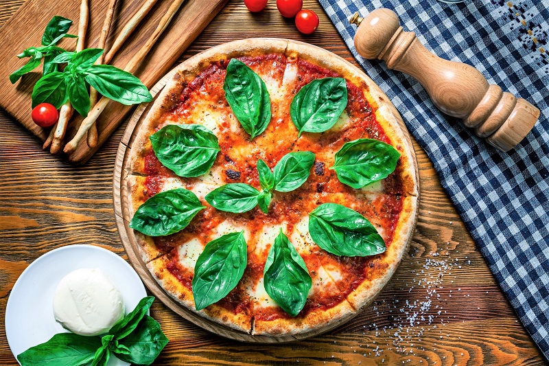 whole wheat pizza with basil