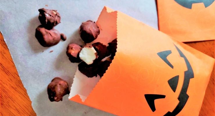 chocolate covered peppermint gems in Halloween candy bag