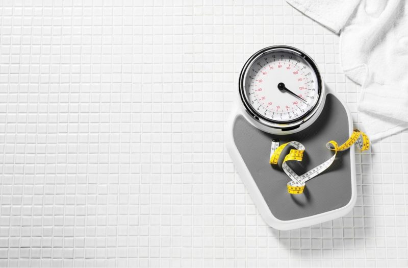 Scale with measuring tape