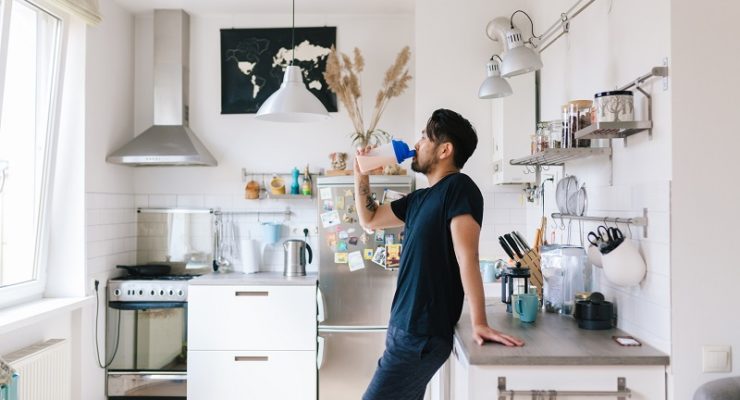 man drinking protein shake for simple weight loss