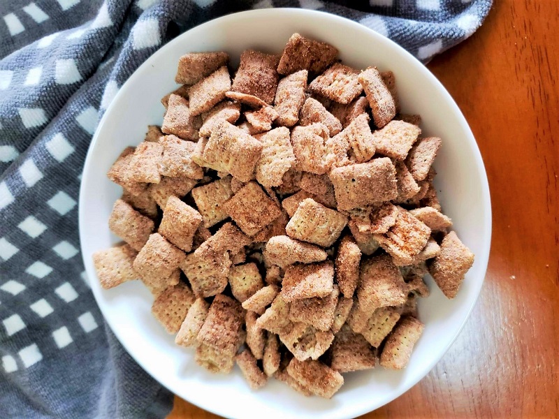 bowl of peanut butter puppy chow snack recipe