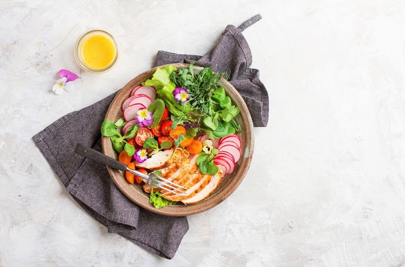 a healthy spring salad in a bowl
