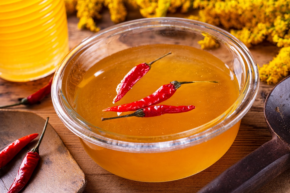 A bowl of delicious hot chili infused honey
