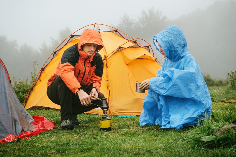 a man and a woman on a camping trip