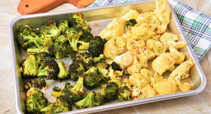 roasted broccoli and cauliflower on a sheet pan