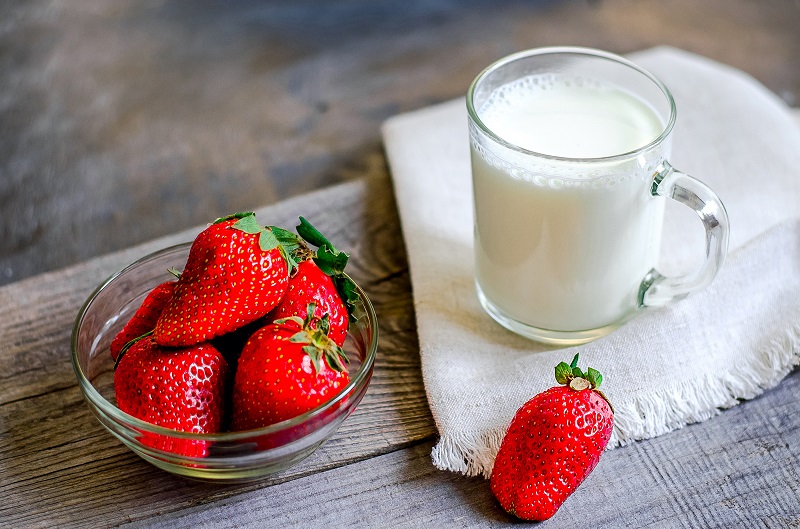 A Glass of Milk with Strawberries
