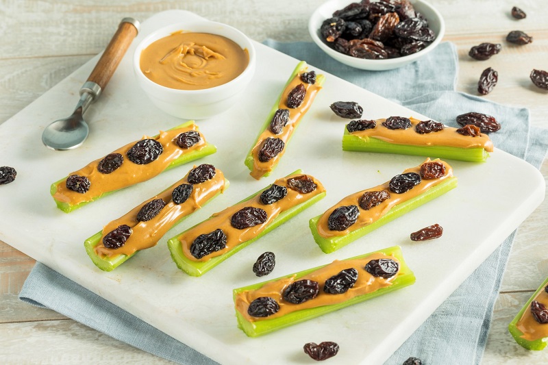 Celery, Peanut Butter and Raisins ants on a log snack
