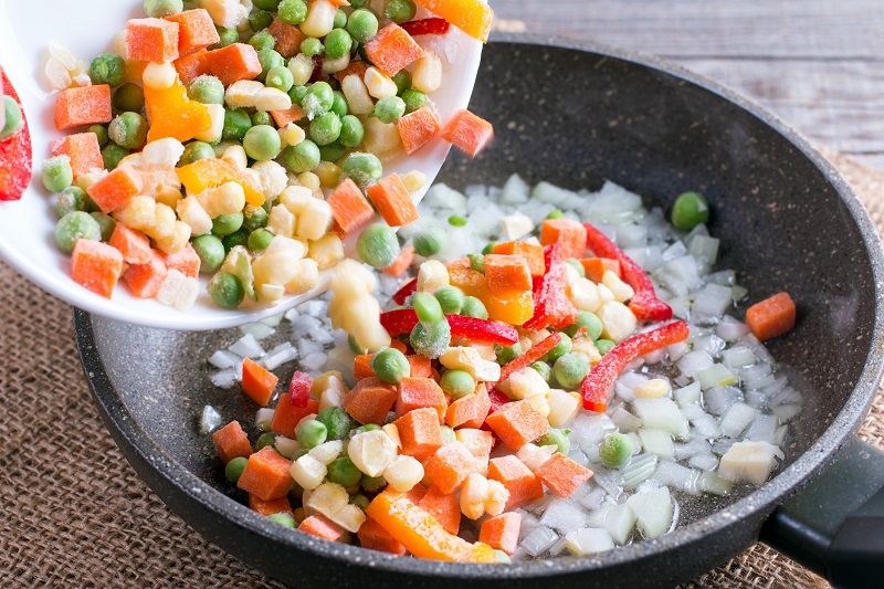 fried frozen vegetables in a pan