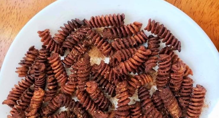 Air Fryer Churro Pasta Chips with cinnamon sugar on a plate
