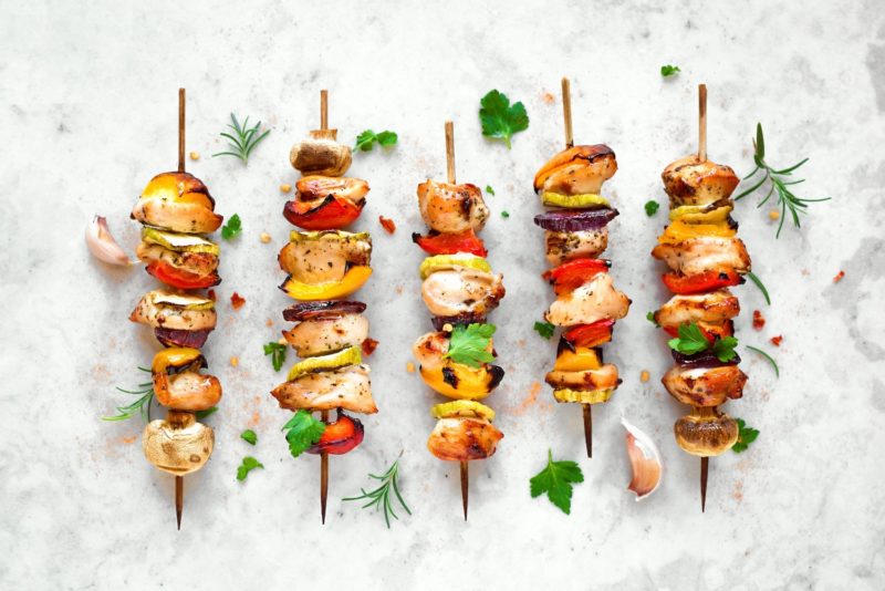 Grilled summer vegetable and chicken skewers