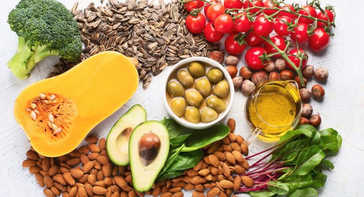 Foods high in vitamin E, like squash, avocado, nuts and seeds