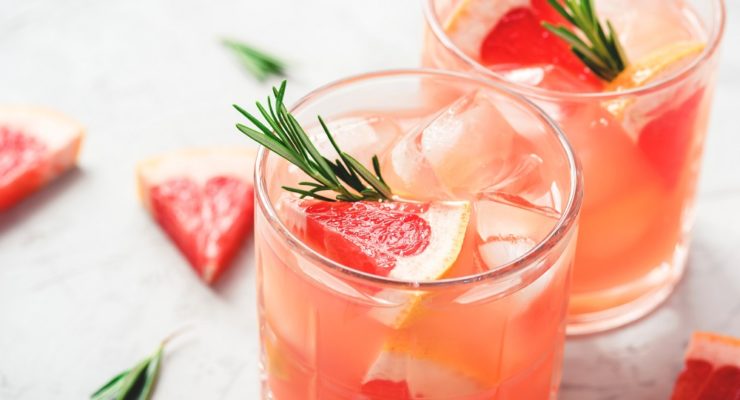 Refreshing grapefruit rosemary and kombucha mocktail with ice