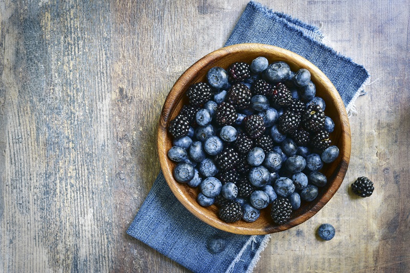 berries in a wooden bowl