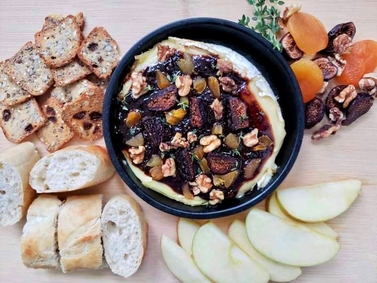 Fruit and Nut Baked Brie is a beautiful addition to your holiday charcuterie board.