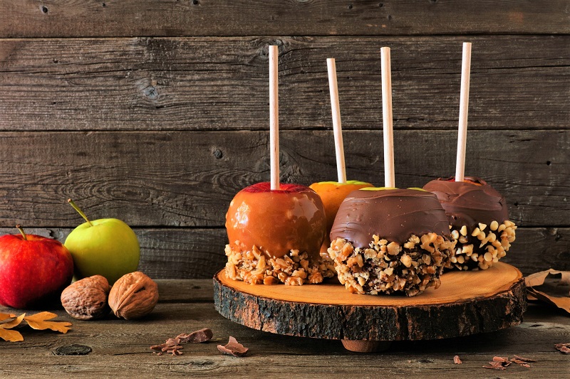 Autumn candy apples with chocolate and caramel