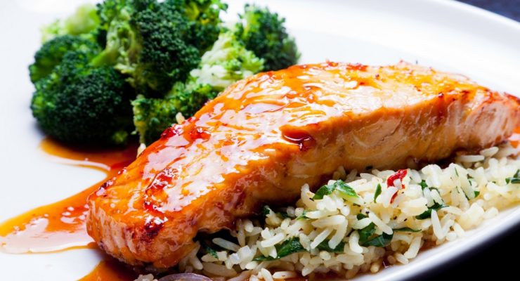 maple glazed salmon served over rice with broccoli