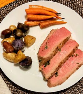 Holiday Herb Butter Roast Beef with Potatoes and Carrots