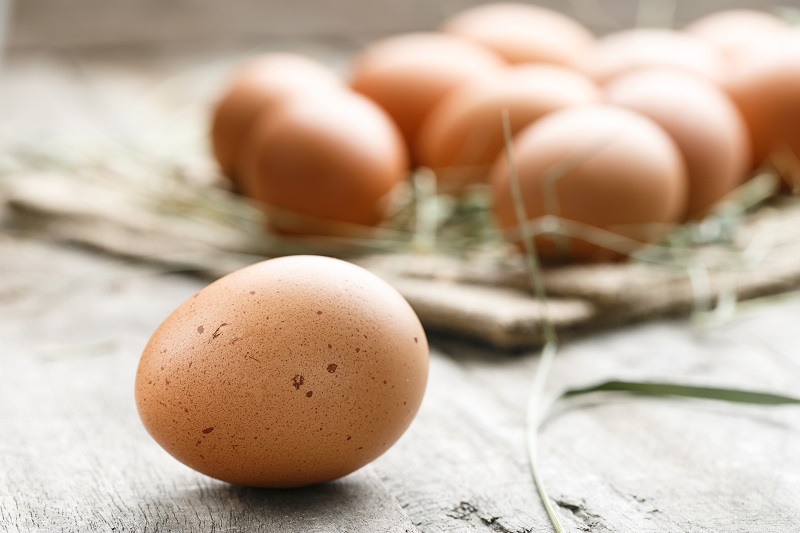 fresh organic farm eggs on burlap