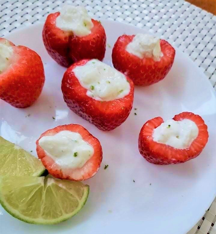 key lime pie stuffed strawberries on a plate