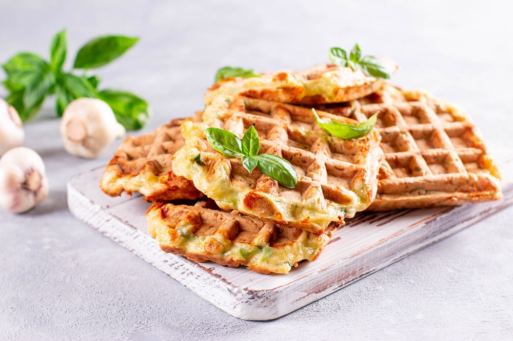 Cheesy Pizza Waffles with vegetables and herbs