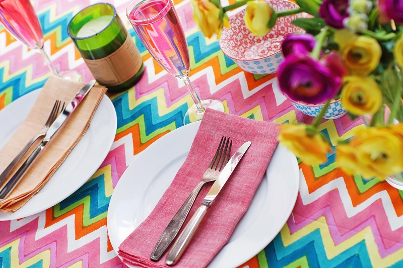 Colorful plate setting at a dinner party