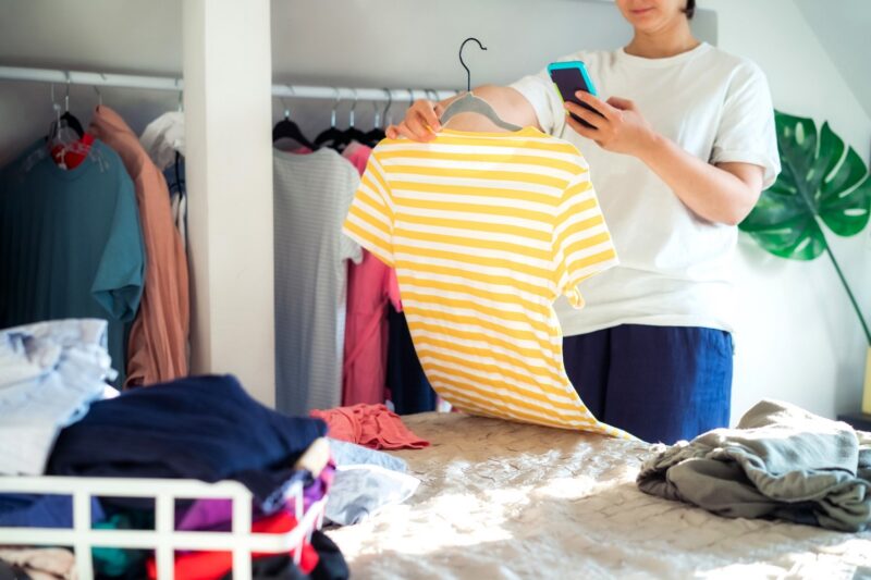 woman selling clothes online spring cleaning