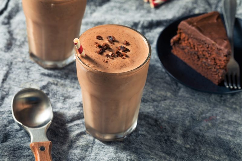 A chocolate shake with a brownie