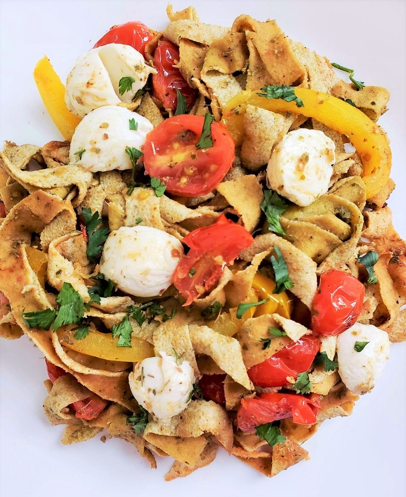 Low Carb pasta made from Egg White Wraps With tomatoes, mozzarella and peppers.