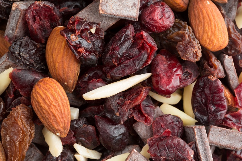 trail mix of dried cranberries, sliced almonds, raisins and chunks of chocolate