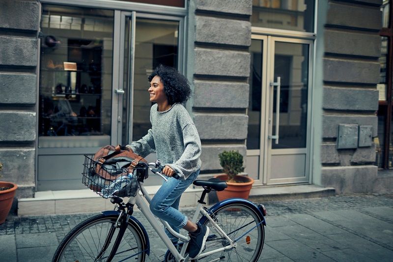 Woman Riding Bicycle In A City