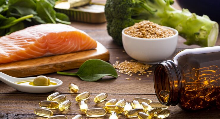 healthy foods and omega 3 supplement on a table