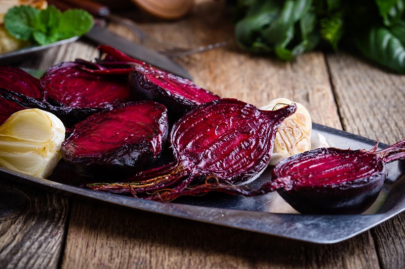 grilled beets on a plate with garlic
