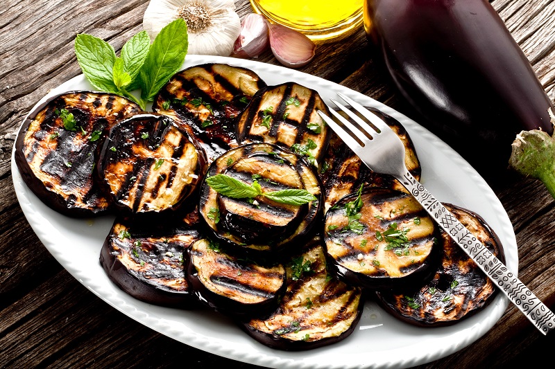 grilled eggplant slices on a plate