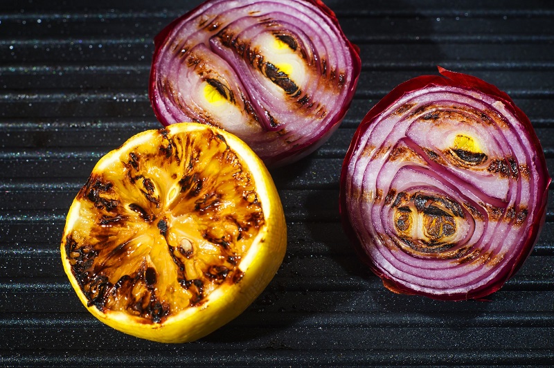 grilled red onions with a lemon
