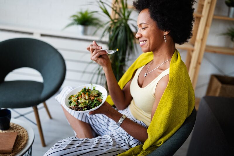 woman eating healthy meal