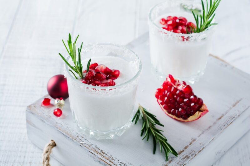 Christmas coconut mojito cocktail with pomegranate seeds