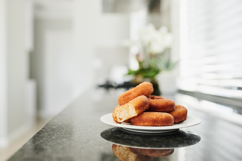 plate of donuts in a kitchen