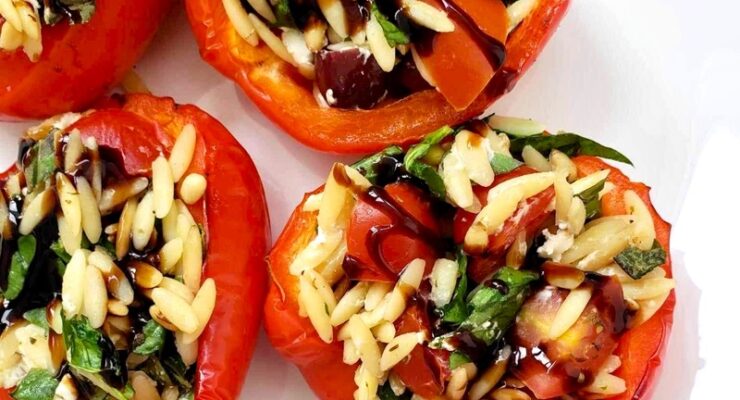 Mediterranean Stuffed Peppers with Orzo, goat cheese, veggies and balsamic