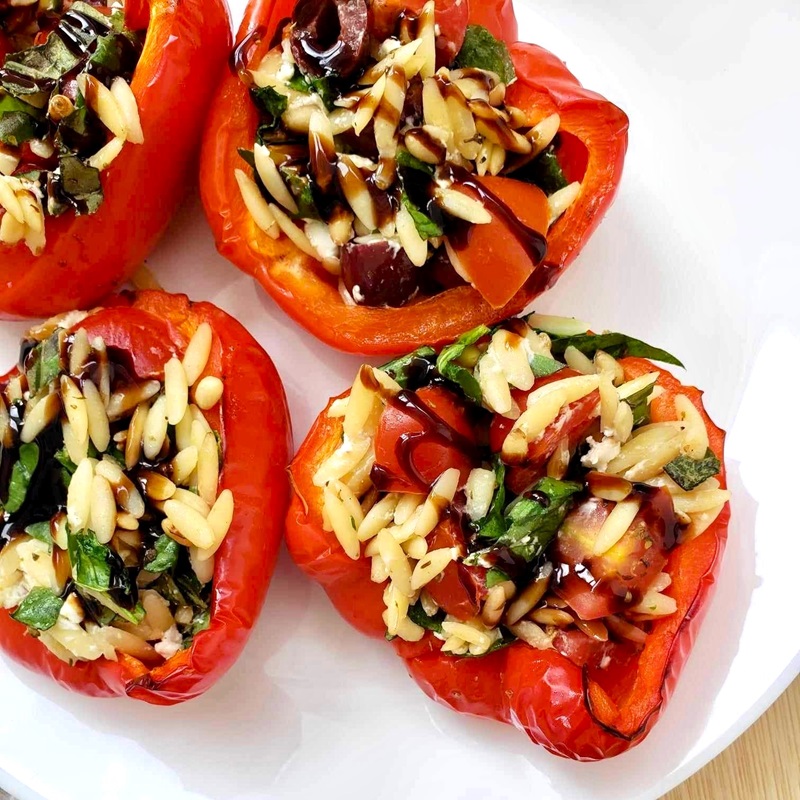 Mediterranean Stuffed Peppers with Orzo, goat cheese, veggies and balsamic