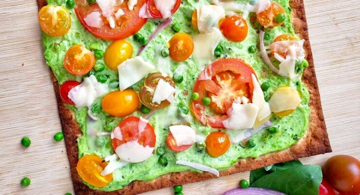 green pea ricotta pizza for spring with fresh vegetables