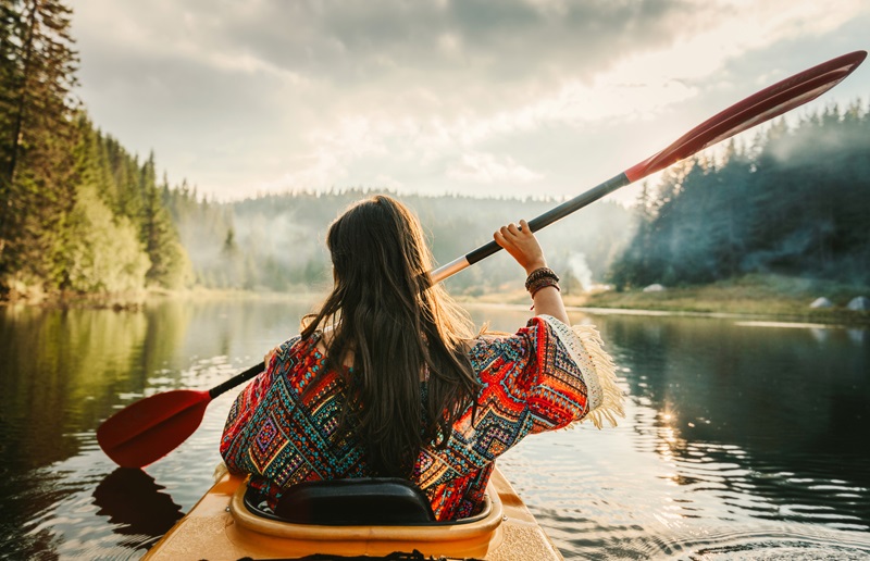 woman kayaking in a lake